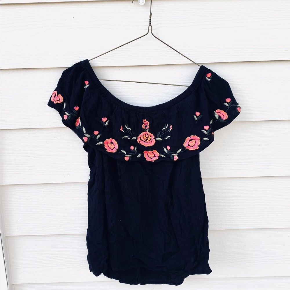 Black- off the shoulder top, with flowered ruffle